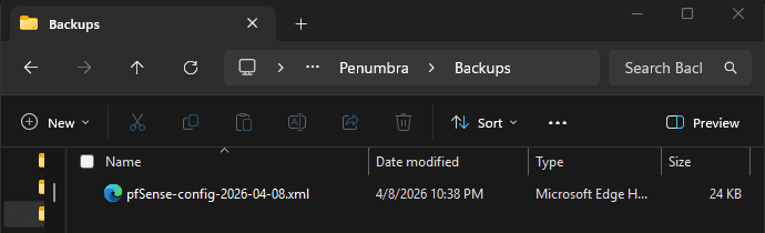 Windows Explorer showing the downloaded pfSense configuration XML file saved to the Penumbra Backups folder with a date-stamped filename such as pfSense-config-2026-04-07.xml