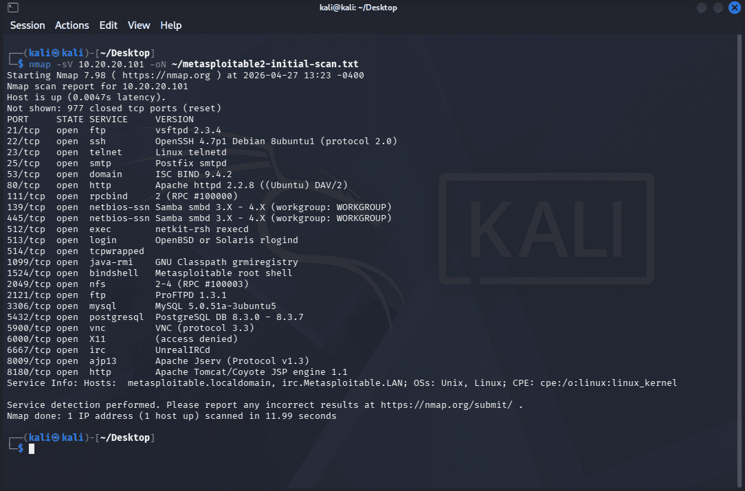 Kali terminal showing the nmap -sV scan with the -oN flag completing and confirming the results were saved to metasploitable2-initial-scan.txt in the home directory